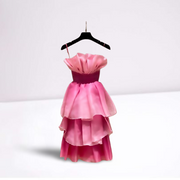 Custom-made party dress designed to flatter your figure.